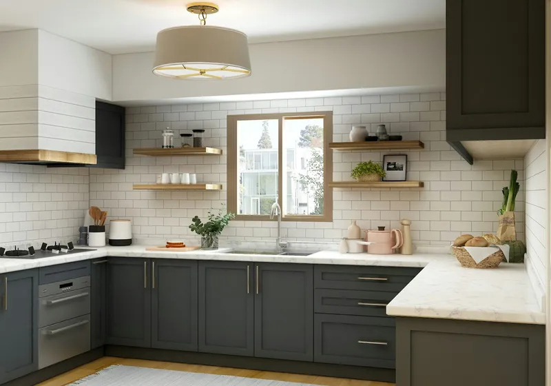 Kitchen with white metro tiles, dark green cabinets, open shelving and a pendant light