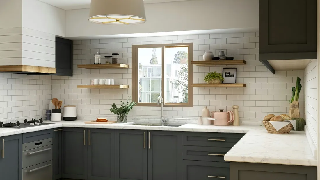 Kitchen with white metro tiles, dark green cabinets, open shelving and a pendant light